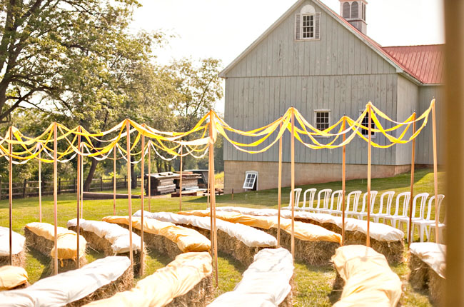 I LOVE the seating with the hay bales and the pretty ribbons lining the 