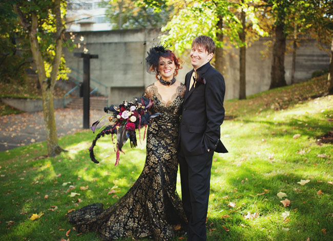 Love that this bride was bold enough to wear a black gold wedding dress