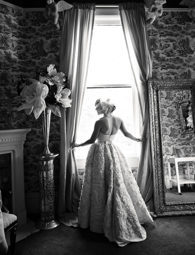 black and white photo of bride in wedding gown