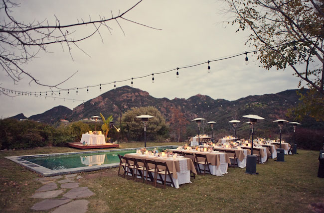 outdoor reception pink centerpieces burlap tablecloth