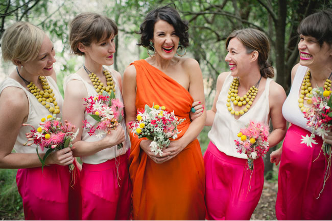 bridesmaids in neon pink and yellow