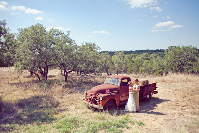 bride and groom with old truck